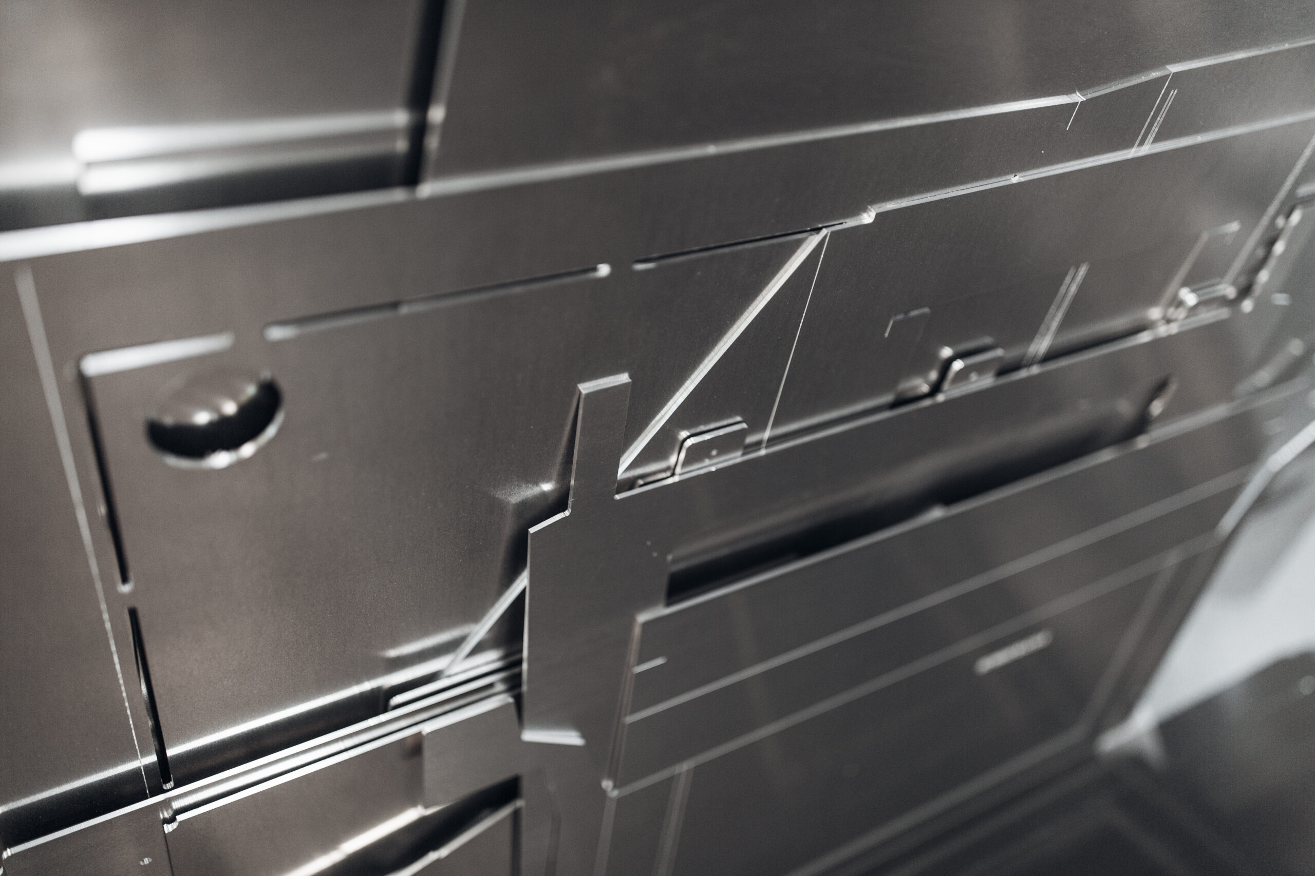 Metal parts cut from stainless steel close up